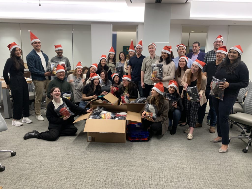Goodwin Law staff assembled 100 winter warming kits for Larkin Street Youth Services. Together they packaged cozy scarves, gloves, neck warmers and other necessities.